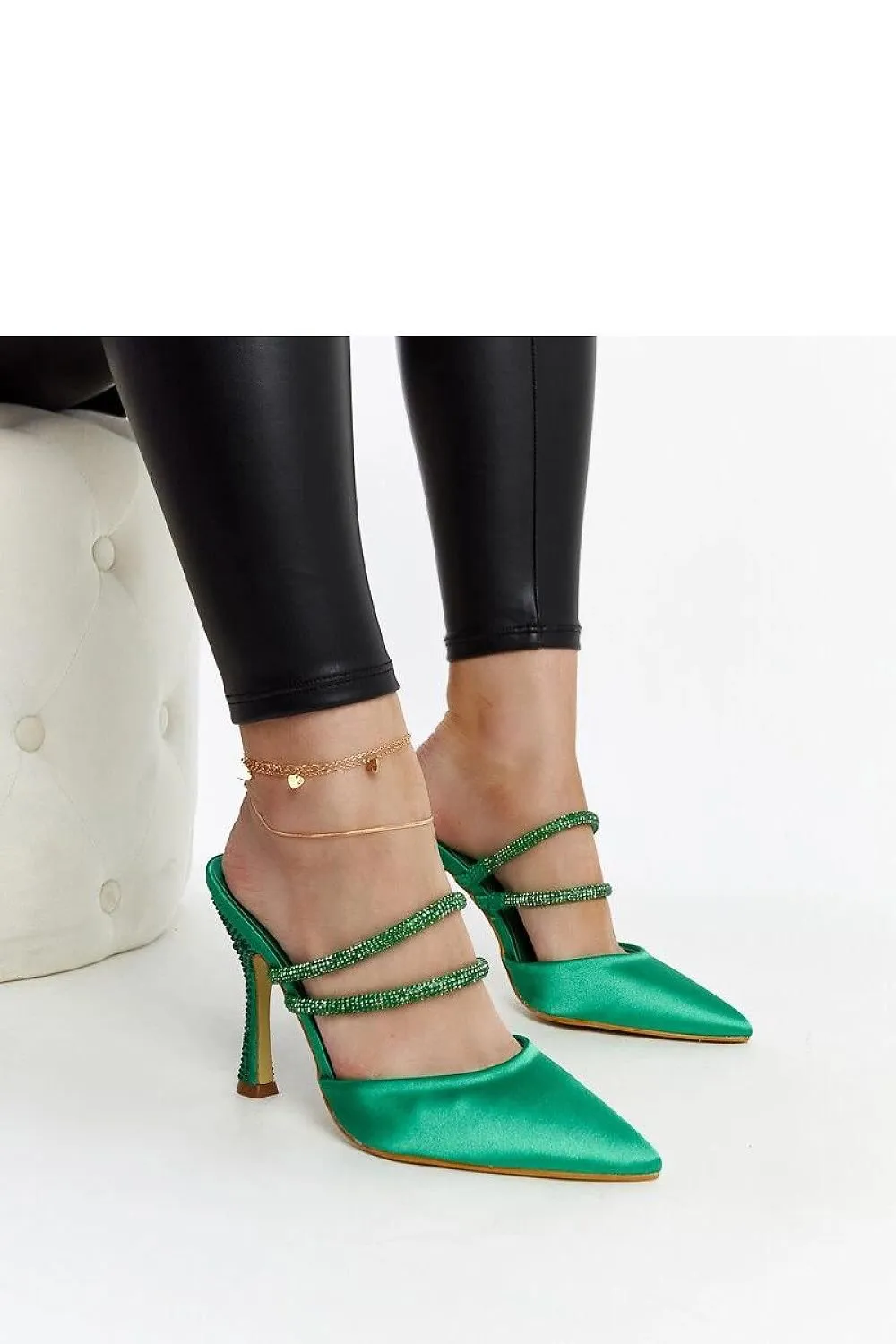 Elegant stylish green high-heeled sandals