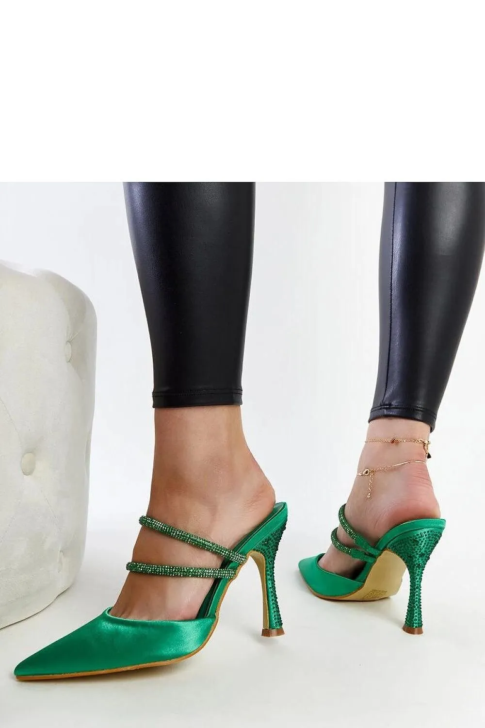 Elegant stylish green high-heeled sandals