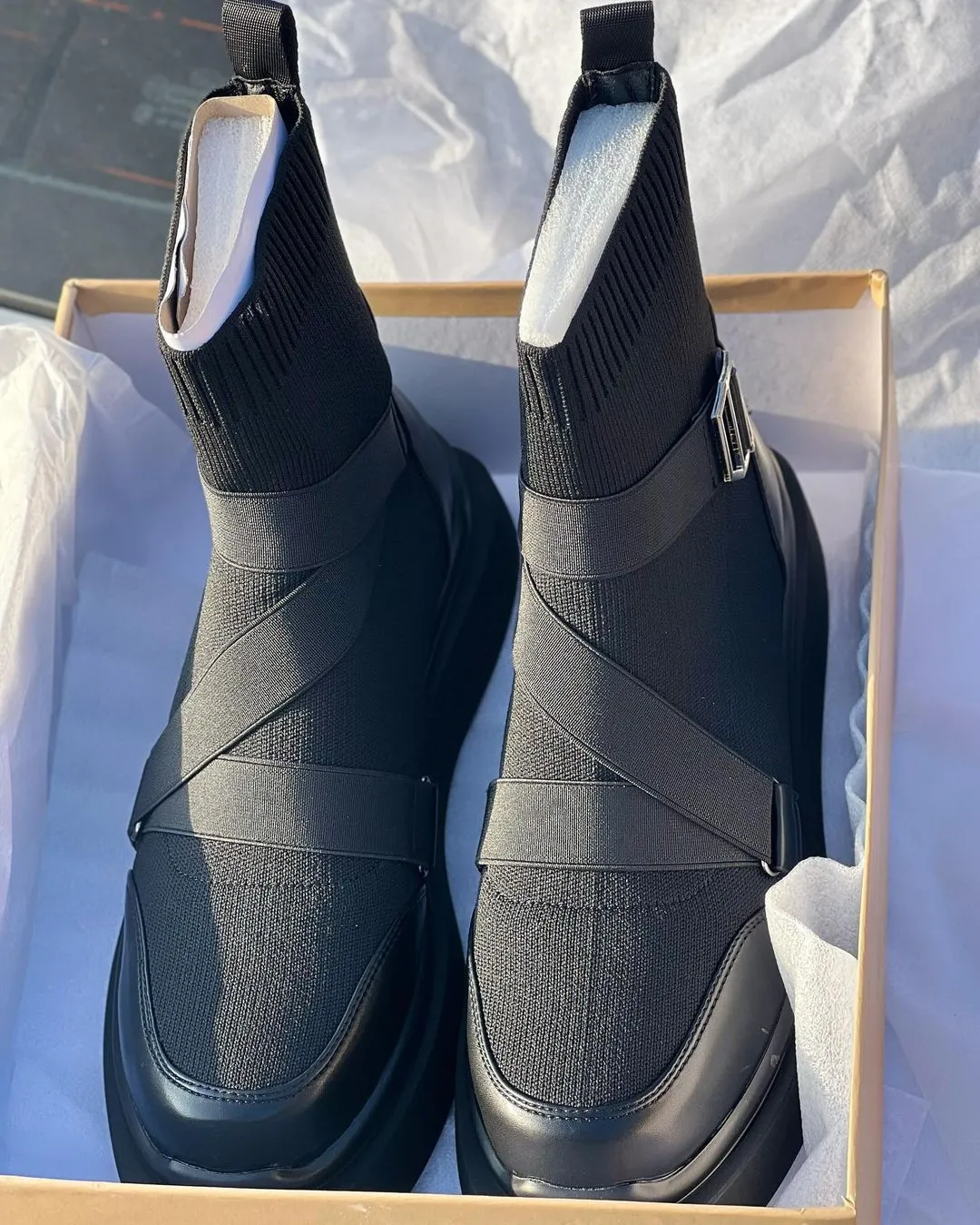 Lace and buckle leather boots