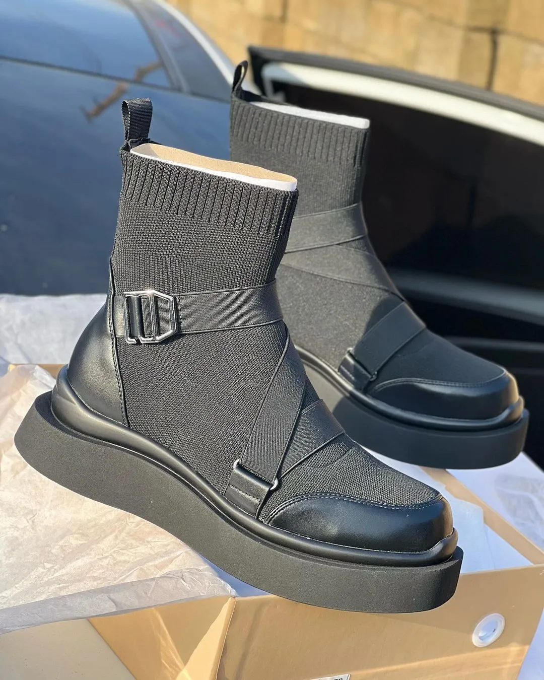 Lace and buckle leather boots