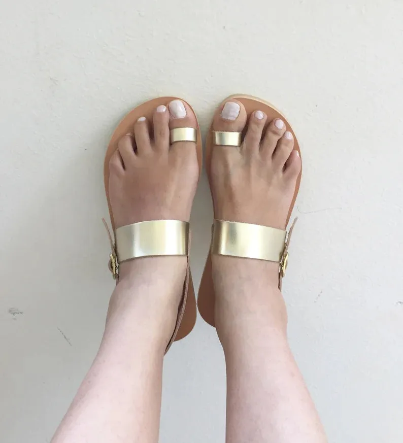Ring toe ankle strap leather sandals