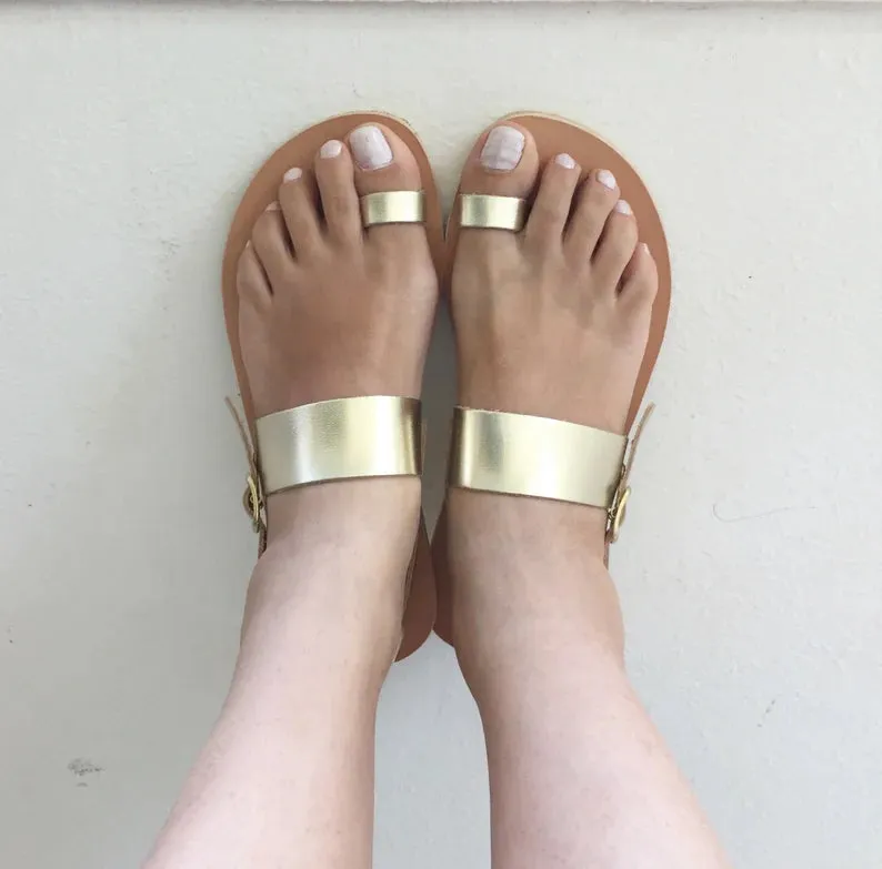 Ring toe ankle strap leather sandals