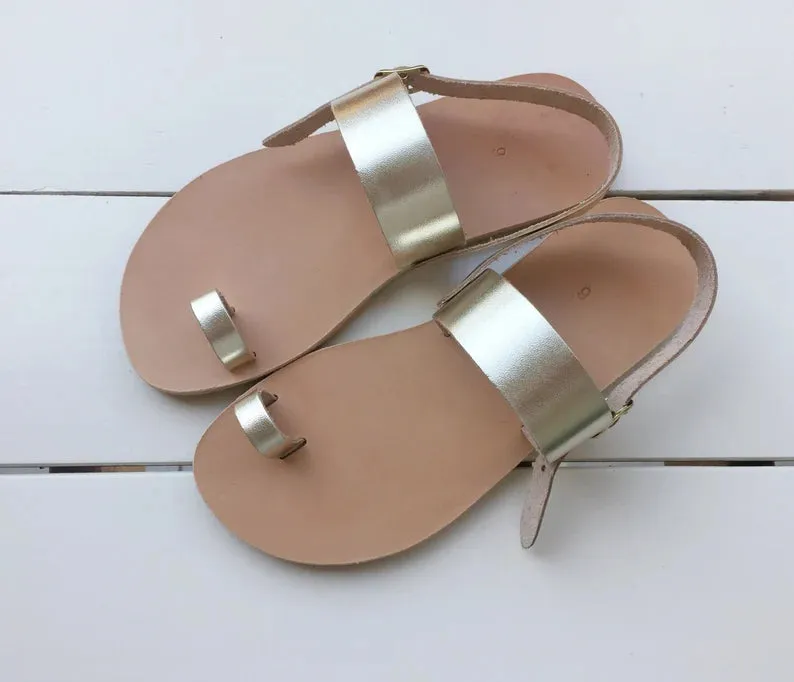 Ring toe ankle strap leather sandals